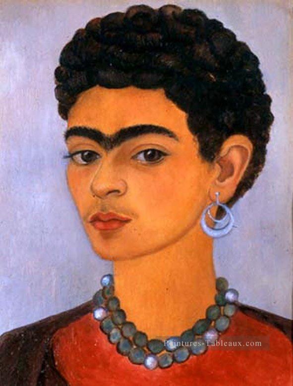 Autoportrait avec des cheveux bouclés féminisme Frida Kahlo Peintures à l'huile
